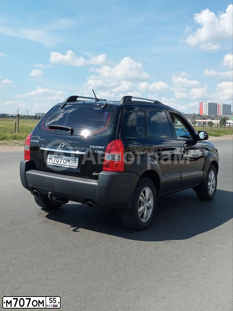 Фото автомобиля HYUNDAI TUCSON, 2008 — госномер М707ОМ55. Цвет: ЧЕРНЫЙ