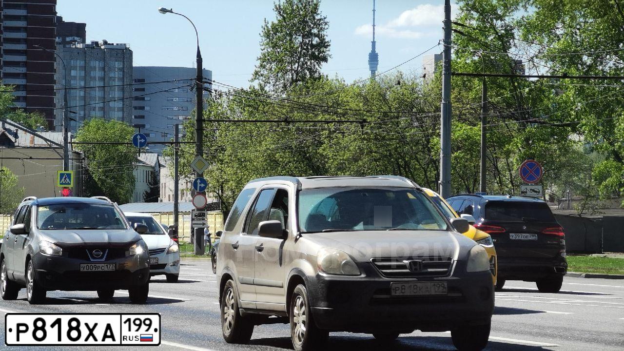 Фото автомобиля HONDA PILOT, 2008 — госномер В699РУ77. Цвет: ЧЕРНЫЙ