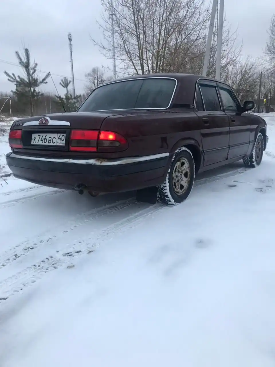 Фото автомобиля GAZ 3110, 2007 — госномер У341ТС797. Цвет: кампари
