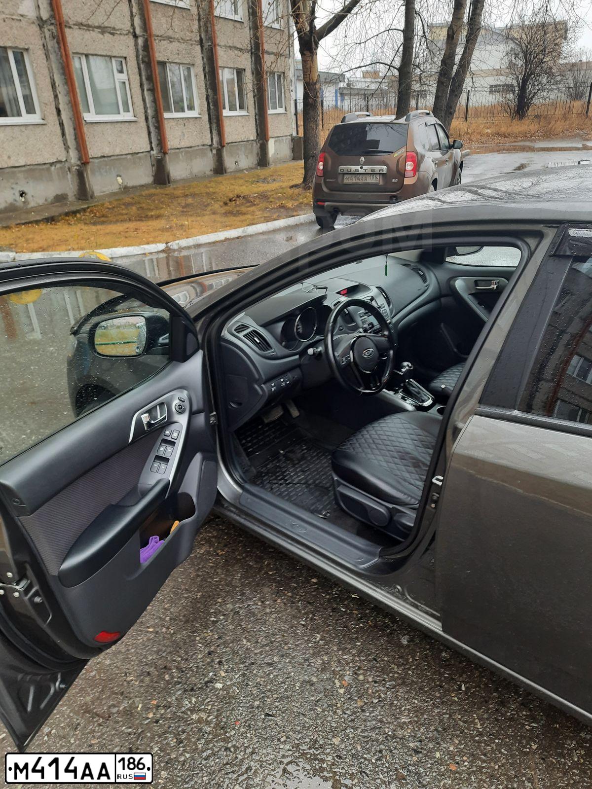 Фото автомобиля RENAULT DUSTER, 2012 — госномер М414АА186. Цвет: Коричневый
