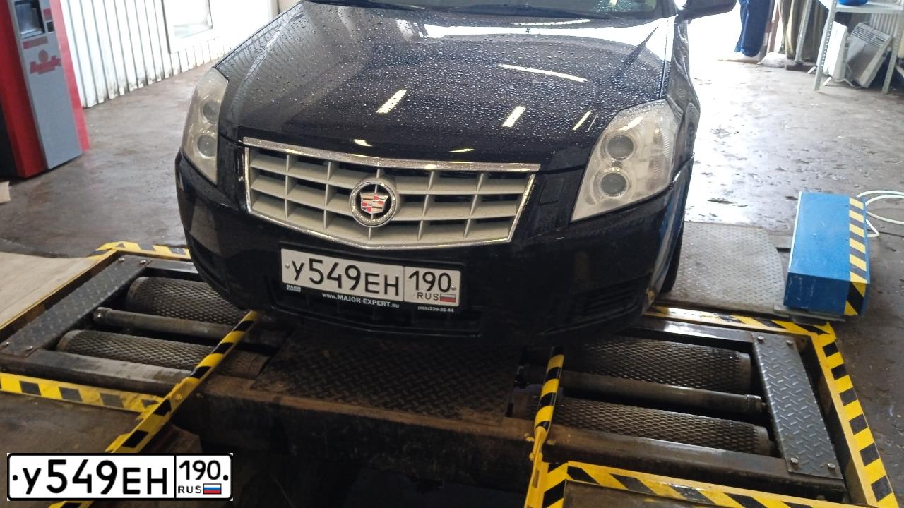 Фото автомобиля CADILLAC BLS, 2007 — госномер Е730ЕР77. Цвет: ЧЕРНЫЙ