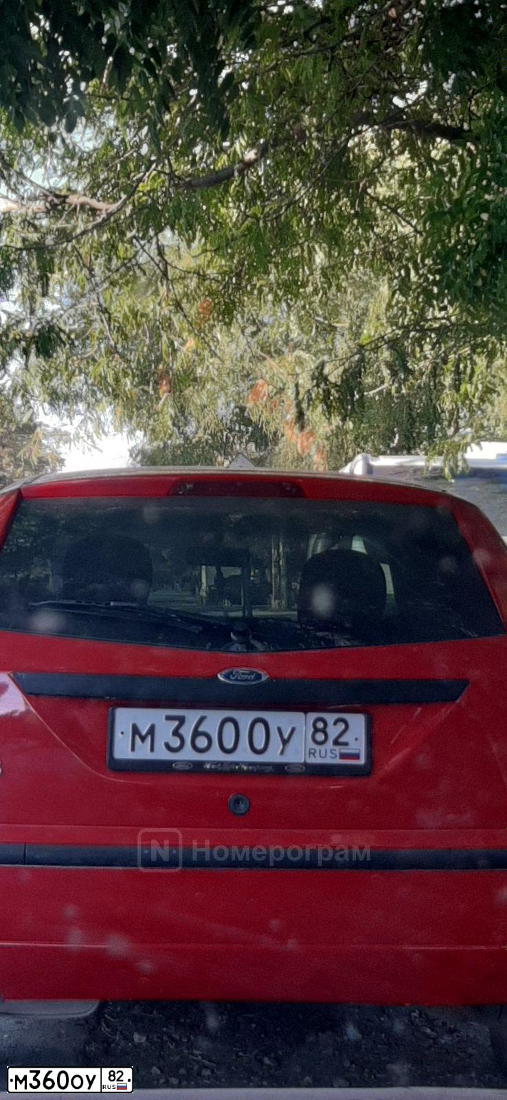 Фото автомобиля FORD FOCUS, 2004 — госномер А100НМ21. Цвет: Красный