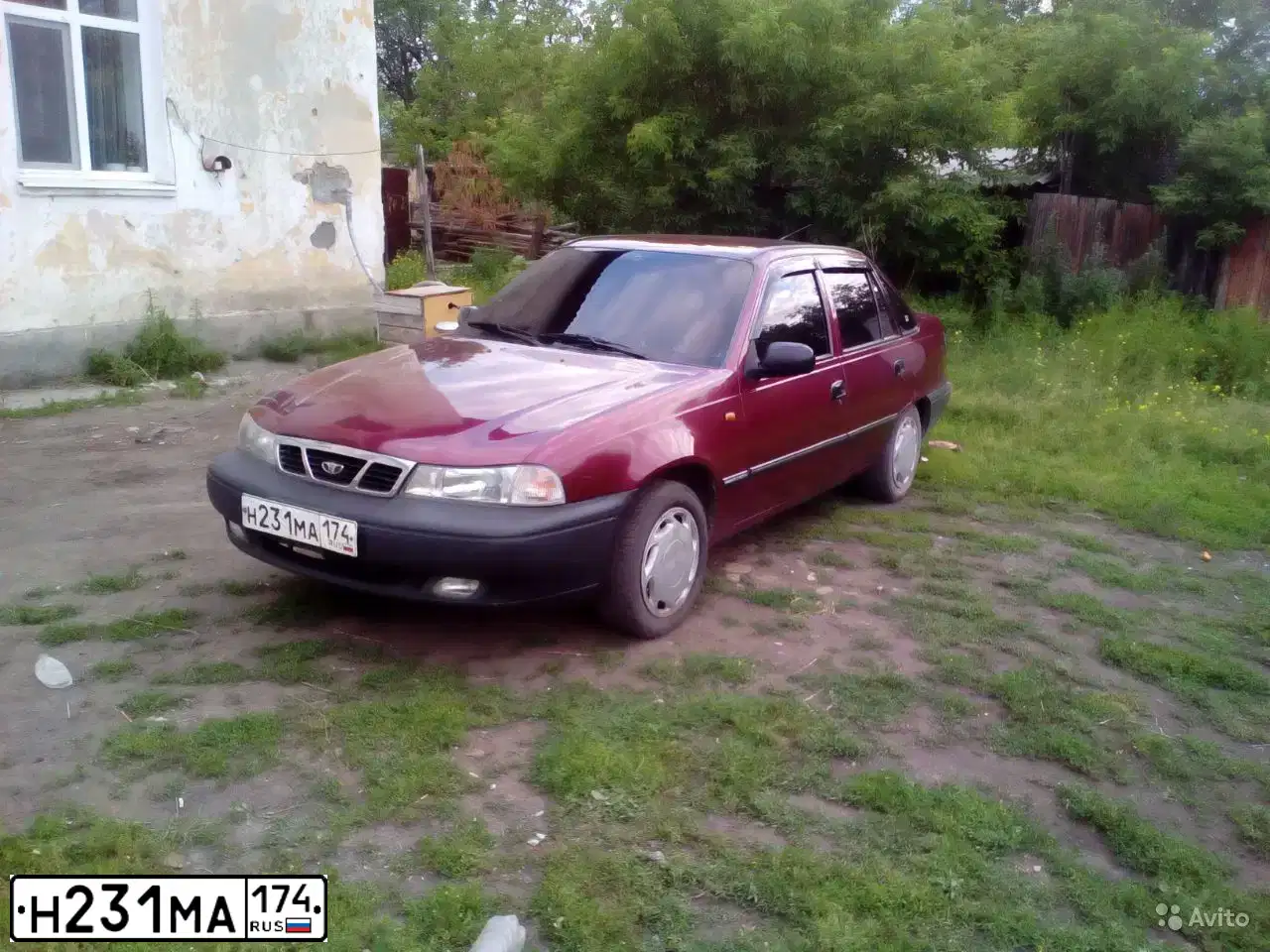Фото автомобиля DAEWOO NEXIA, 2007 — госномер Н231МА174. Цвет: ИСПАНСКИЙ КРАСНЫЙ