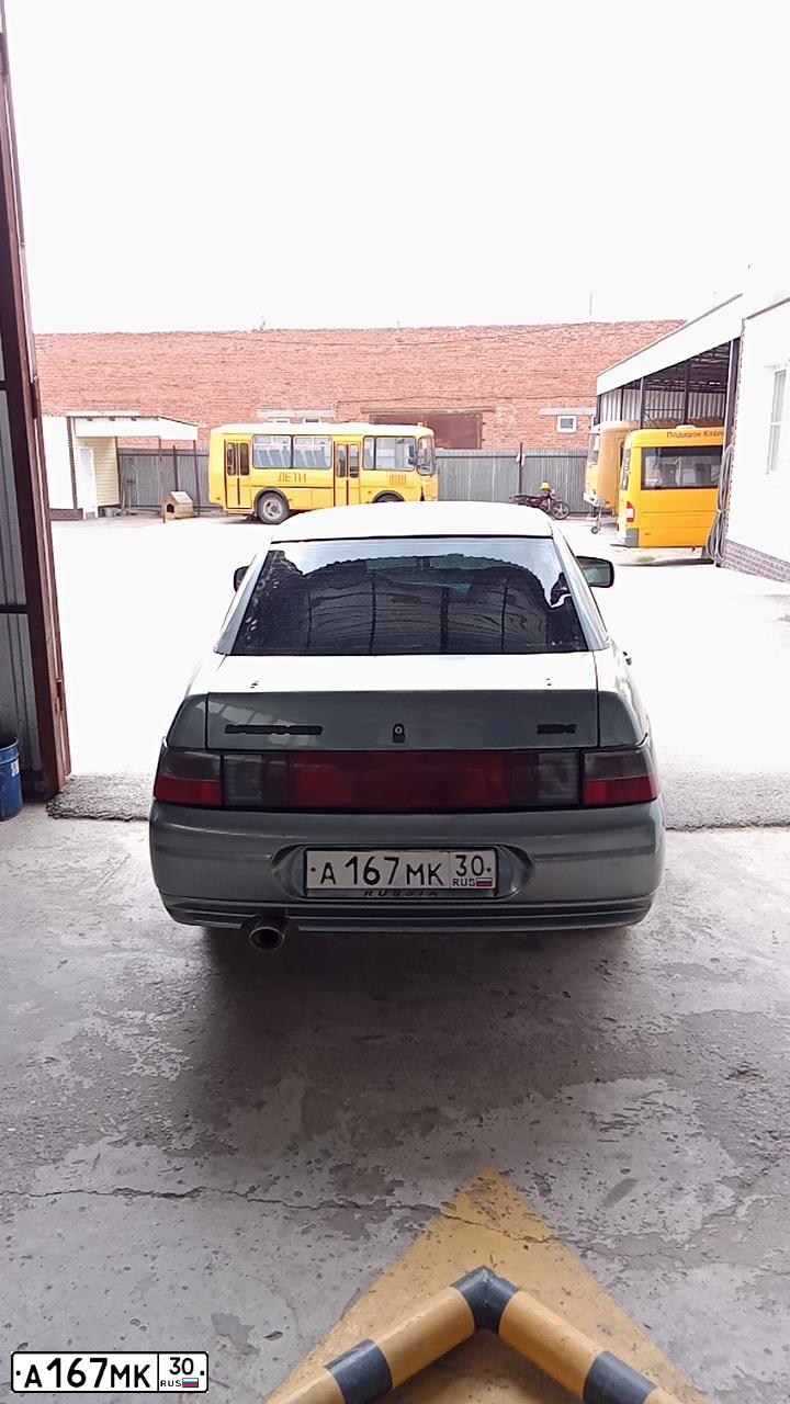 Фото автомобиля LADA 2110 LADA, 2006 — госномер К616НН30. Цвет: средний серо-зеленый металлик