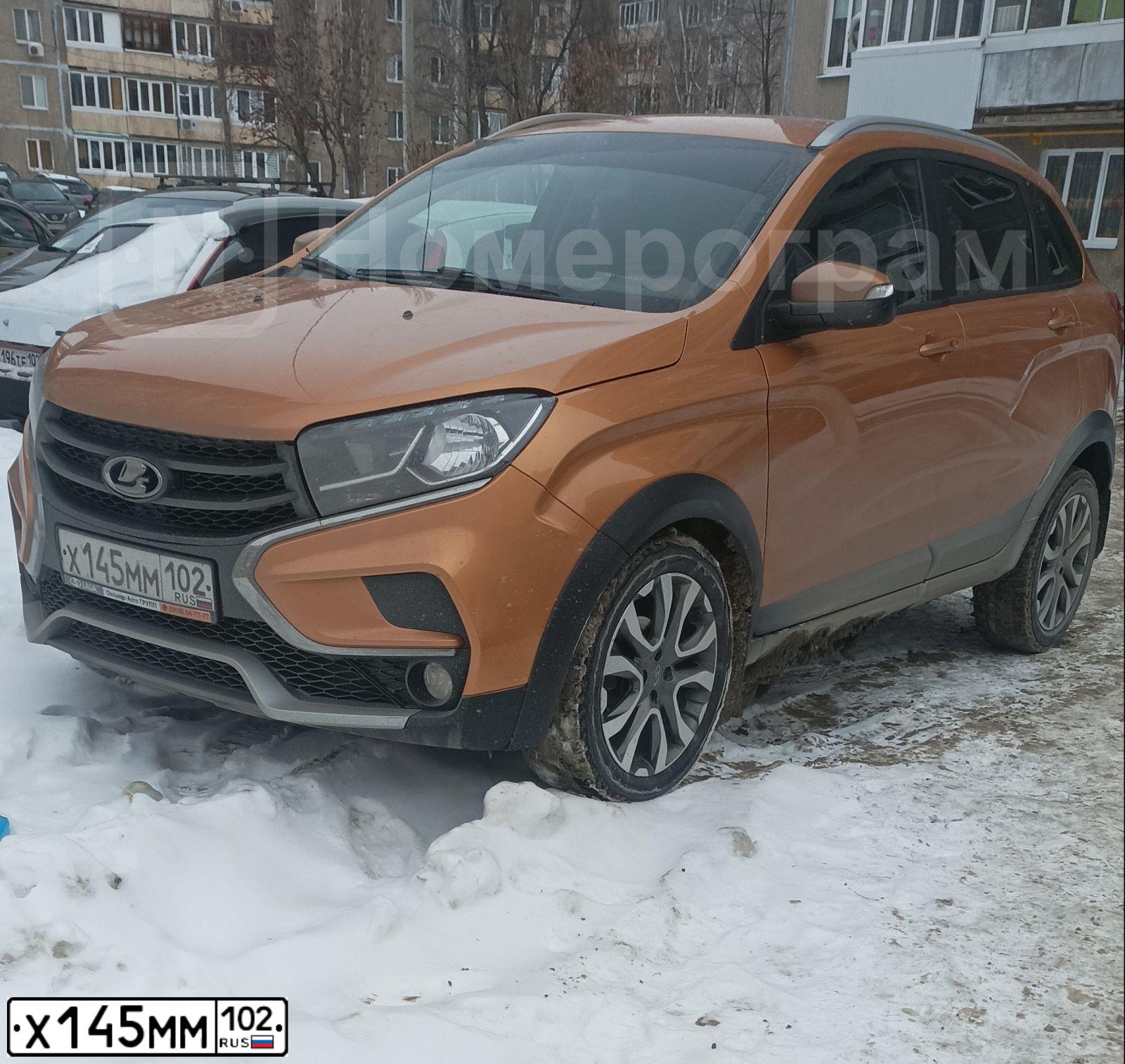 Фото автомобиля LADA XRAY, 2018 — госномер Х145ММ102. Цвет: Золотисто-охристый