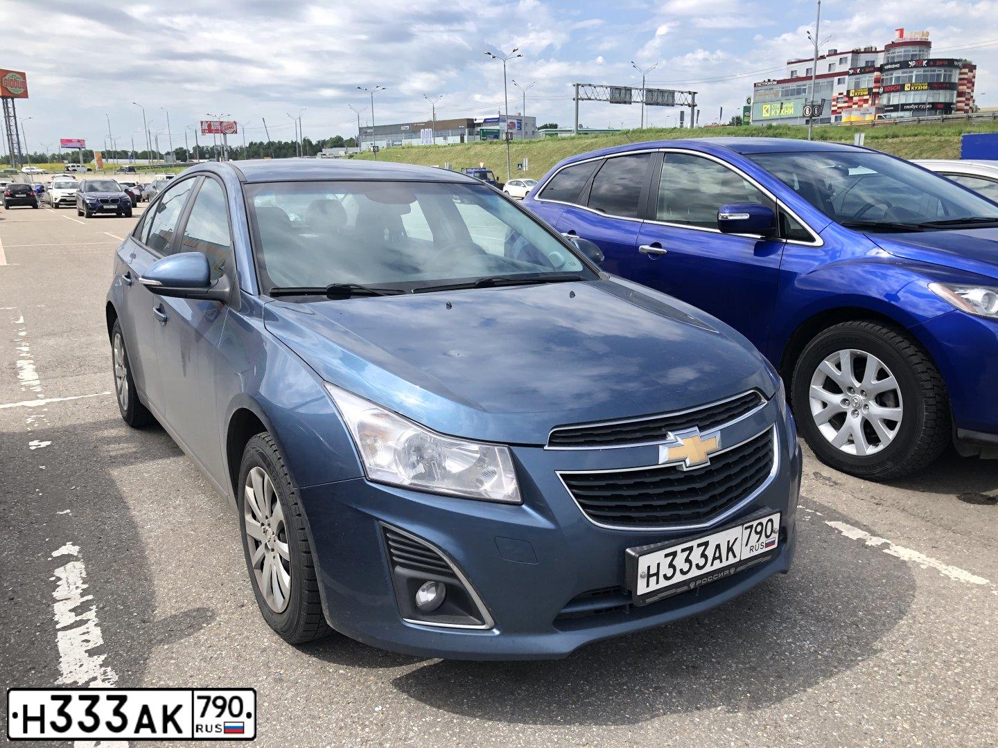 Фото автомобиля CHEVROLET CRUZE, 2014 — госномер Н333АК790. Цвет: синий