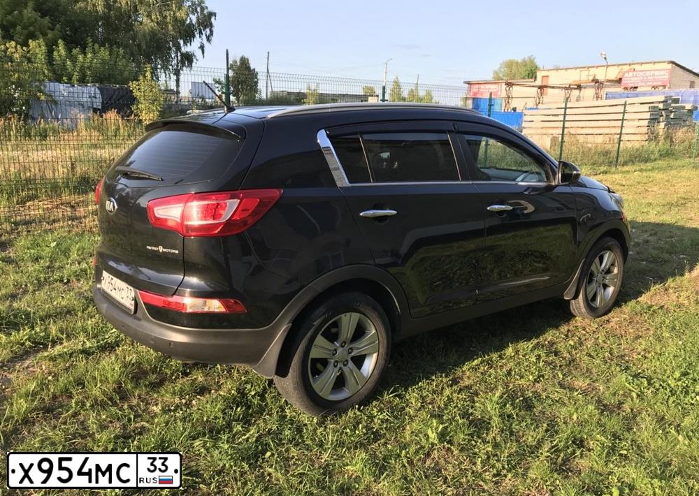 Фото автомобиля KIA SPORTAGE, 2013 — госномер Х954МС33. Цвет: ЧЕРНЫЙ ПЕРЛАМУТР