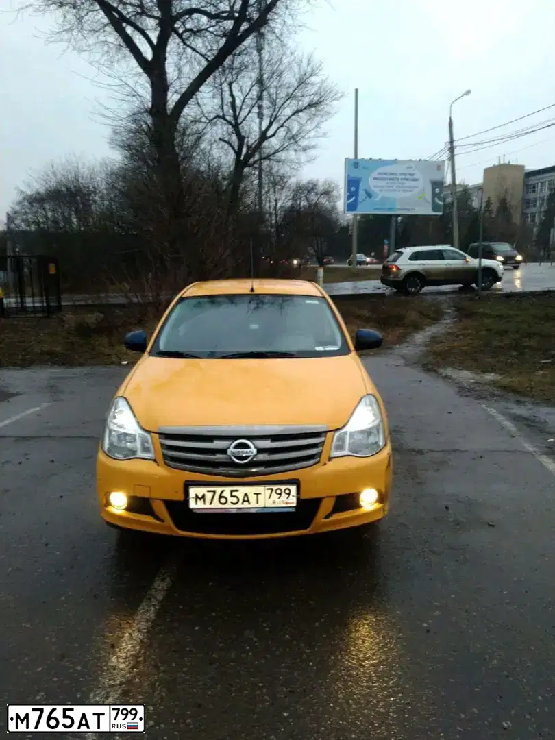 Фото автомобиля NISSAN ALMERA /AVTOVAZ/, 2017 — госномер М765АТ799. Цвет: СИНИЙ