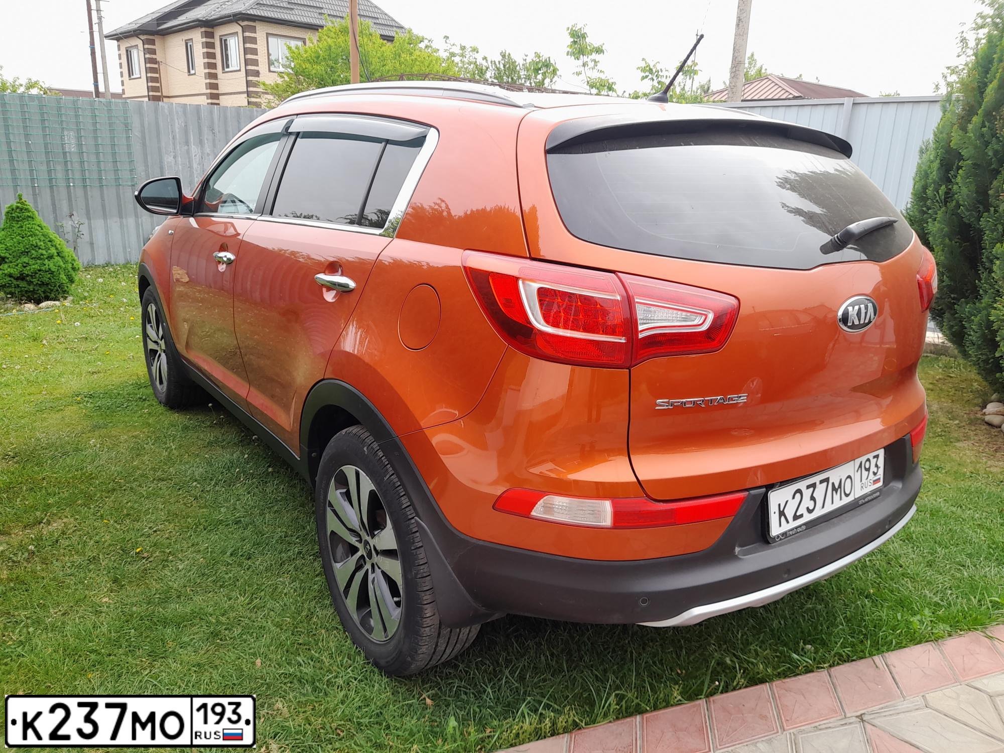 Фото автомобиля KIA SPORTAGE, 2012 — госномер Т994ОУ193. Цвет: Оранжевый