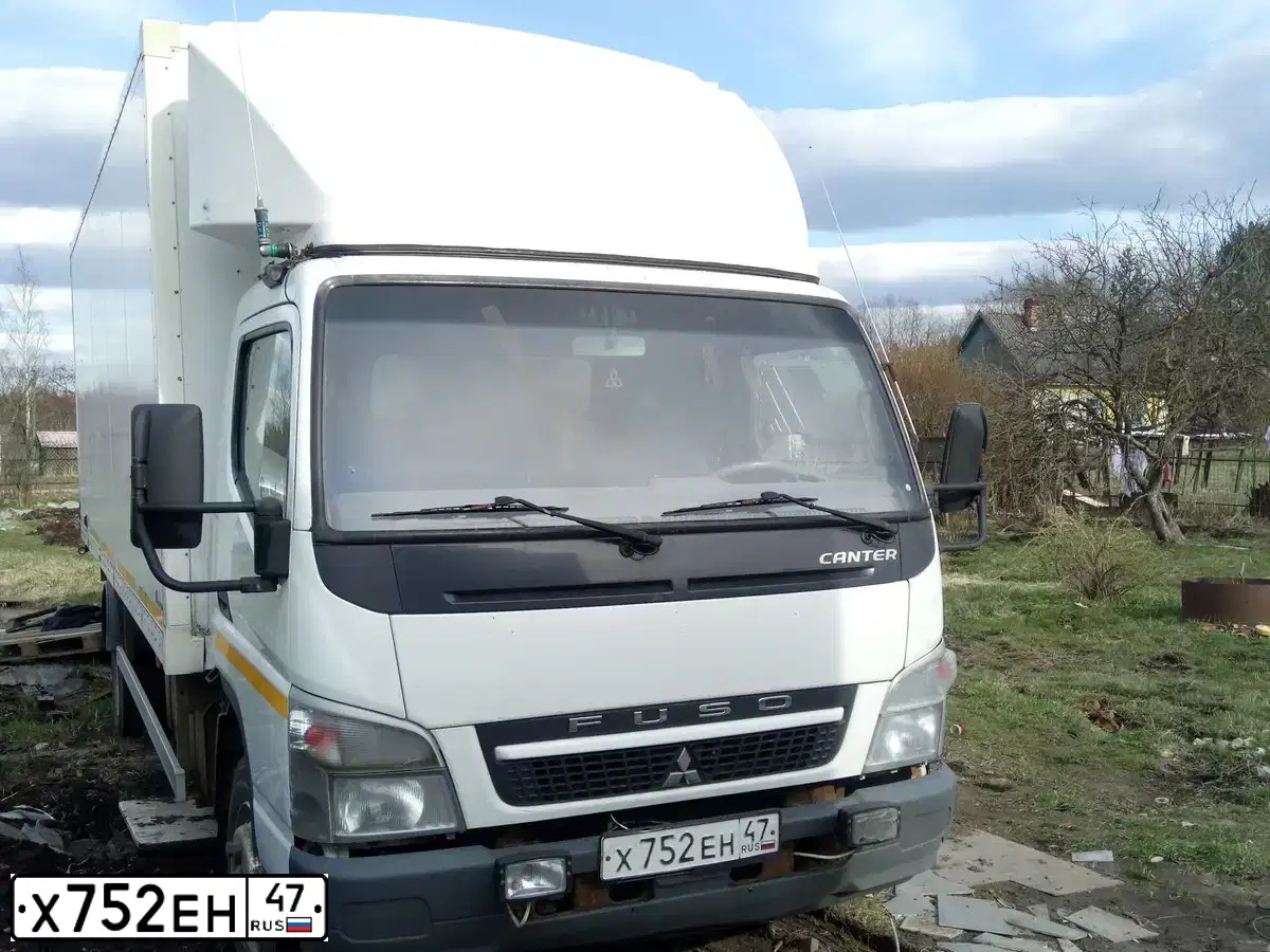 Фото автомобиля FUSO O CANTER, 2012 — госномер А543СМ60. Цвет: Белый