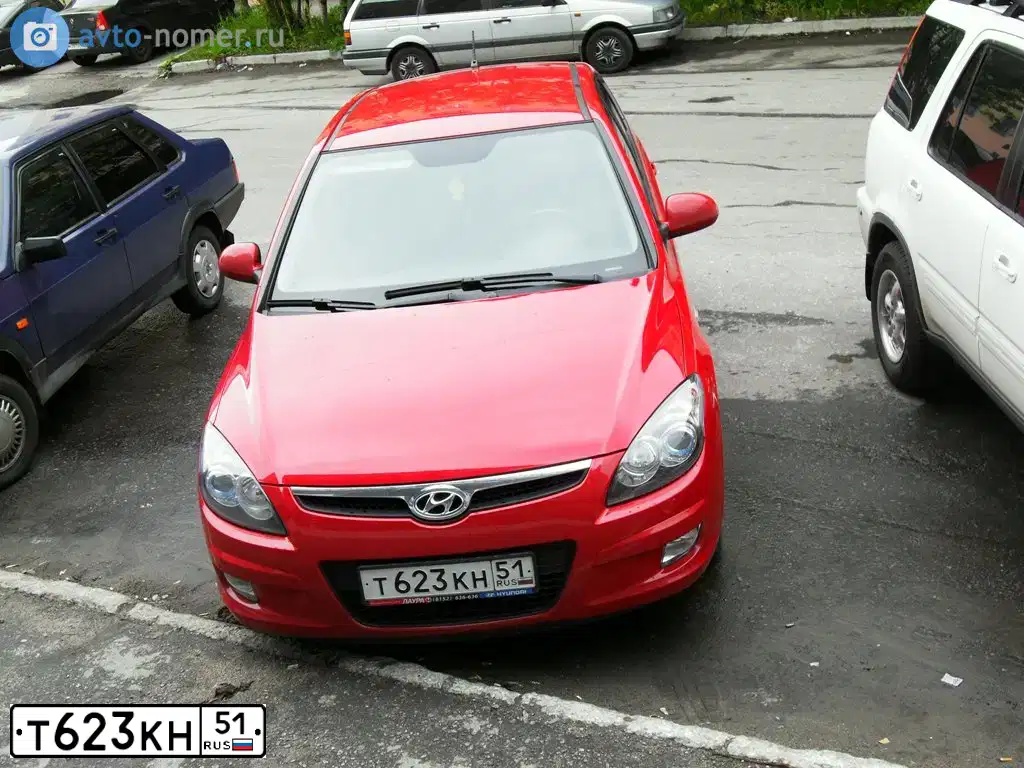 Фото автомобиля HYUNDAI I30, 2009 — госномер Т623КН51. Цвет: Красный