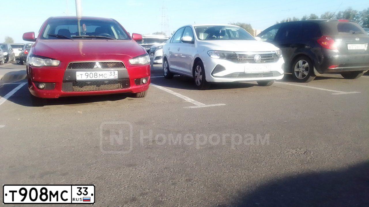 Фото автомобиля MITSUBISHI LANCER, 2008 — госномер Т908МС33. Цвет: КРАСНЫЙ