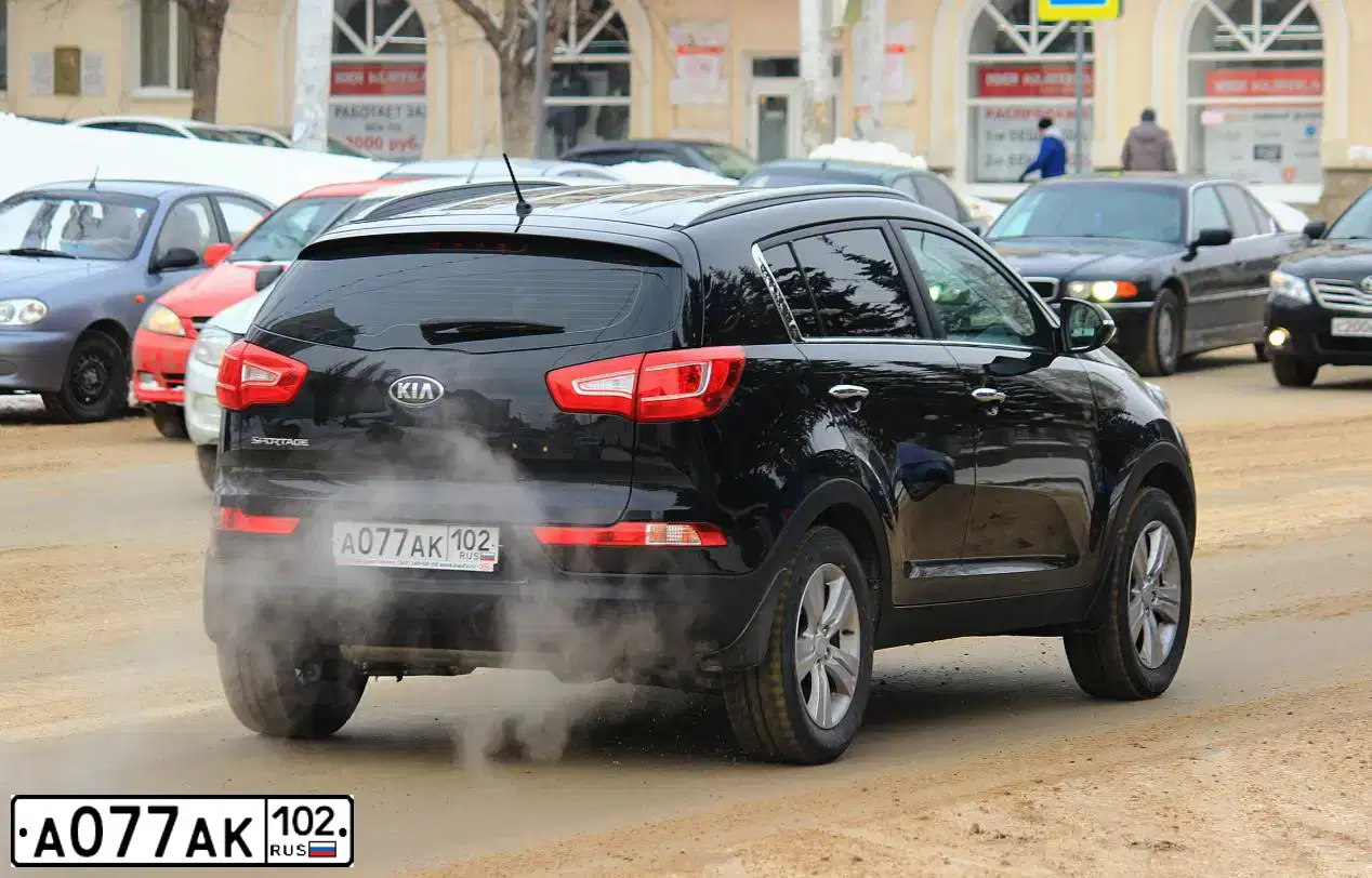 Фото автомобиля KIA SPORTAGE, 2009 — госномер А077АК102. Цвет: ЧЕРНЫЙ ПЕРЛАМУТР