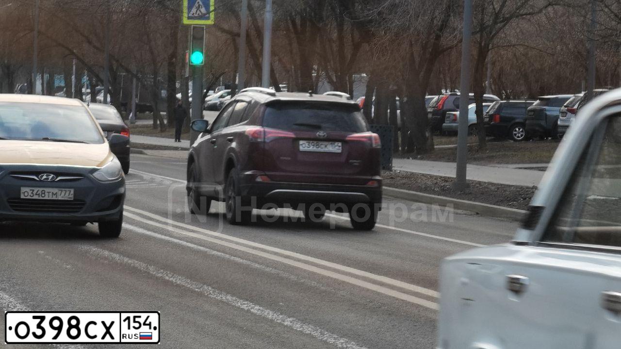 Фото автомобиля KIA RIO, 2015 — госномер О398СХ154. Цвет: Белый