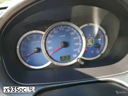 Фото автомобиля MITSUBISHI L 200, 2008 — госномер Х935ОС52. Цвет: СВЕТЛО-СЕРЫЙ