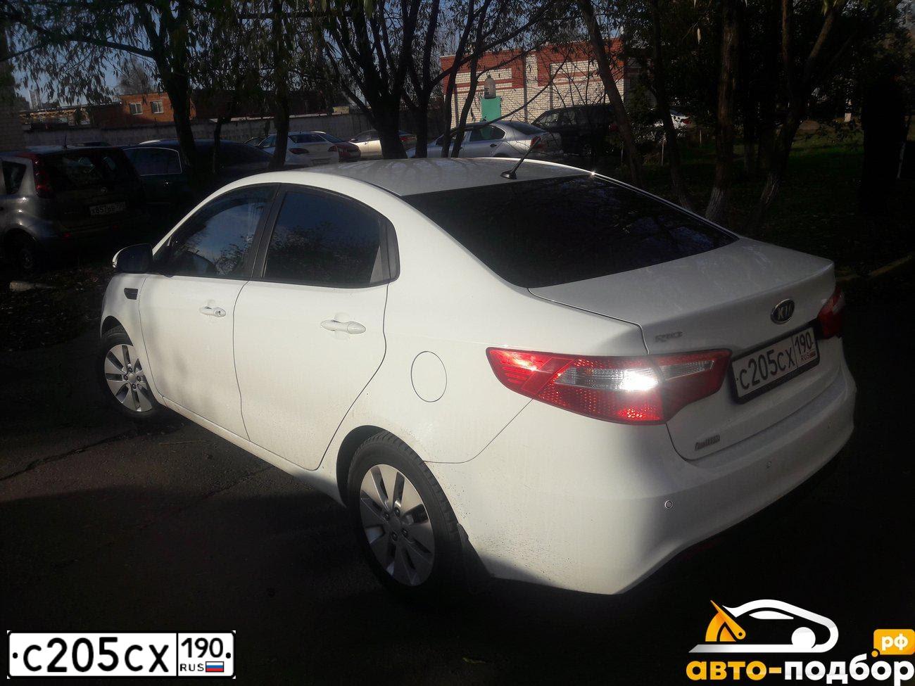 Фото автомобиля KIA RIO, 2012 — госномер В866МН136. Цвет: Белый