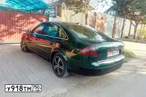 Фото автомобиля AUDI A6, 1998 — госномер С535УТ97. Цвет: ЗЕЛЕНЫЙ ТЕМНЫЙ