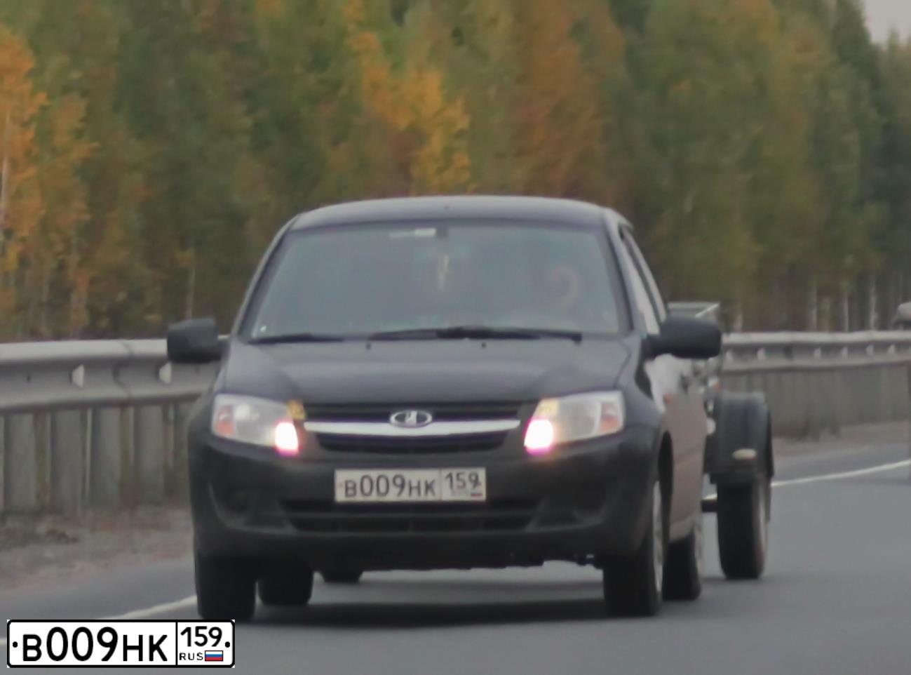 Фото автомобиля LADA 2190 GRANTA, 2012 — госномер О545УА159. Цвет: СЕРО-ЧЕРНЫЙ