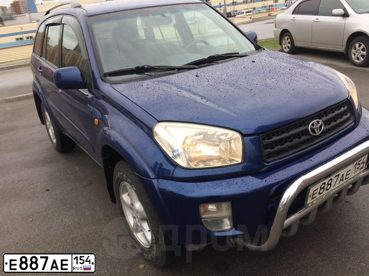 Фото автомобиля TOYOTA RAV4, 2001 — госномер Е887АЕ154. Цвет: синий
