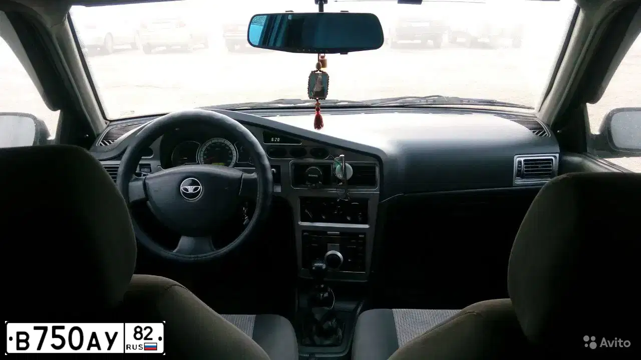 Фото автомобиля DAEWOO NEXIA, 2009 — госномер В750АУ82. Цвет: ЧЕРНО-СИНИЙ