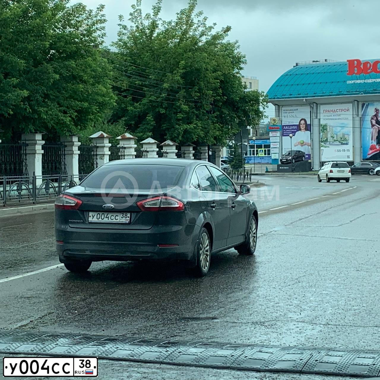 Фото автомобиля FORD MONDEO, 2011 — госномер У004СС38. Цвет: ЧЕРНЫЙ