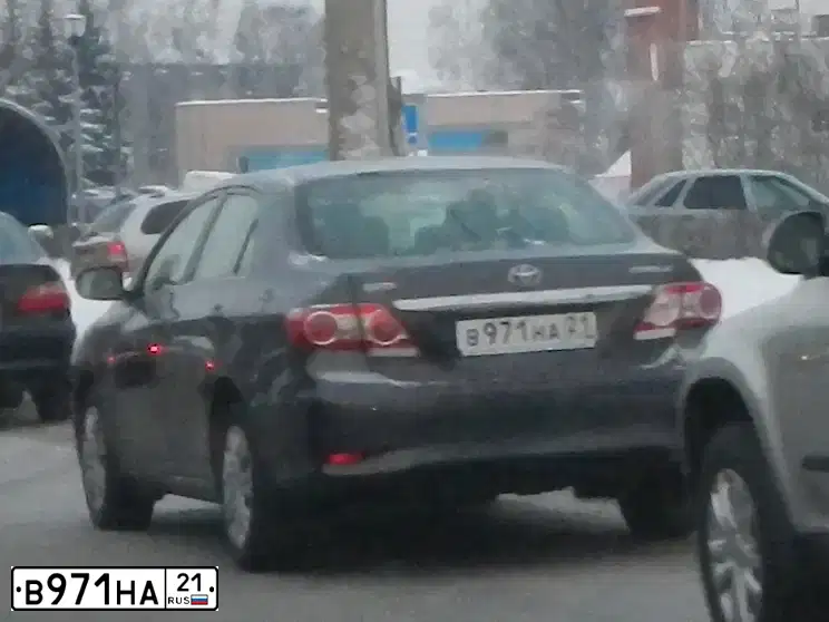 Фото автомобиля TOYOTA COROLLA, 2011 — госномер В971НА21. Цвет: СЕРЫЙ