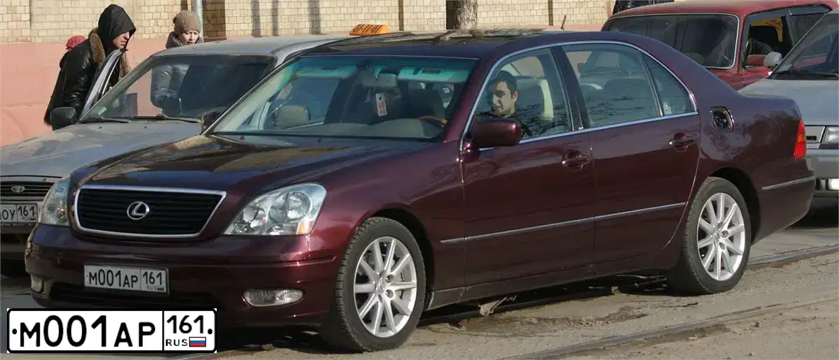 Фото автомобиля LADA 2121 NIVA, 2011 — госномер М001АР161. Цвет: ЯРКО-БЕЛЫЙ