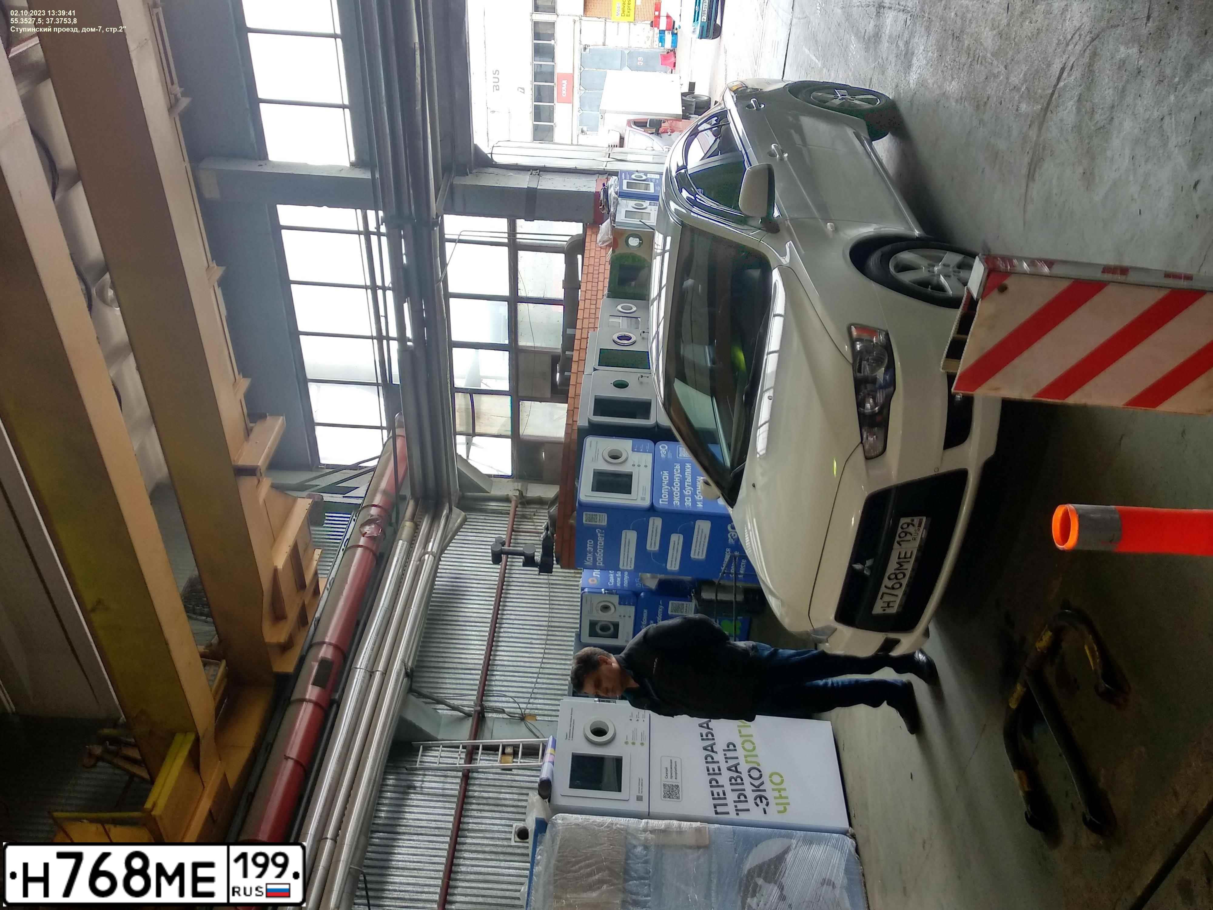 Фото автомобиля MITSUBISHI LANCER, 2008 — госномер Н768МЕ199. Цвет: Белый