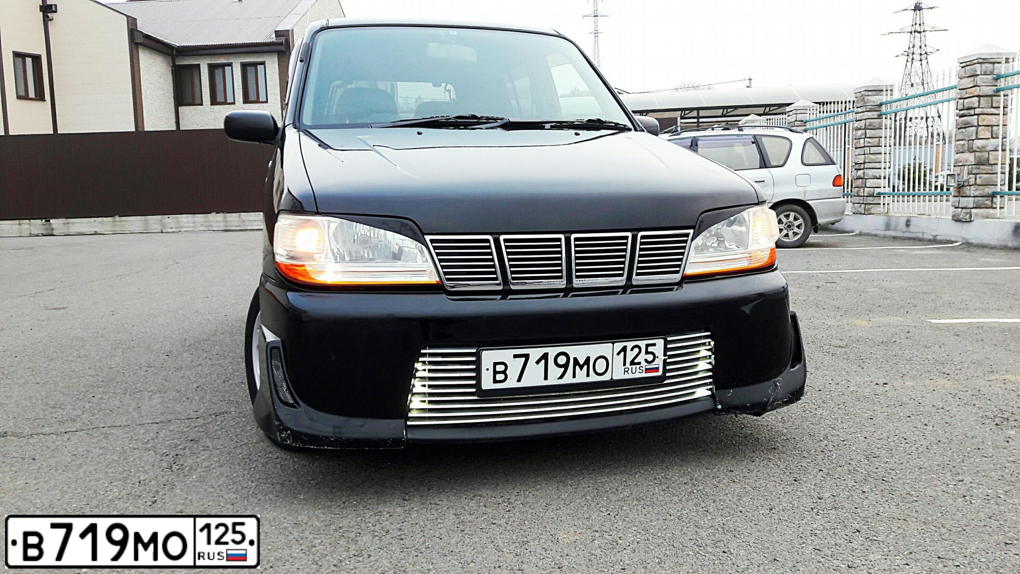 Фото автомобиля NISSAN CUBE, 2002 — госномер А246ОК124