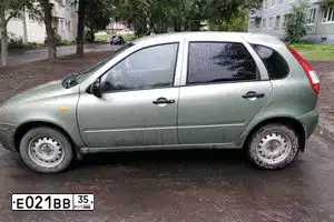 Фото автомобиля LADA 1119 KALINA, 2011 — госномер Е021ВВ35. Цвет: СВЕТЛО-ЗЕЛЕНЫЙ