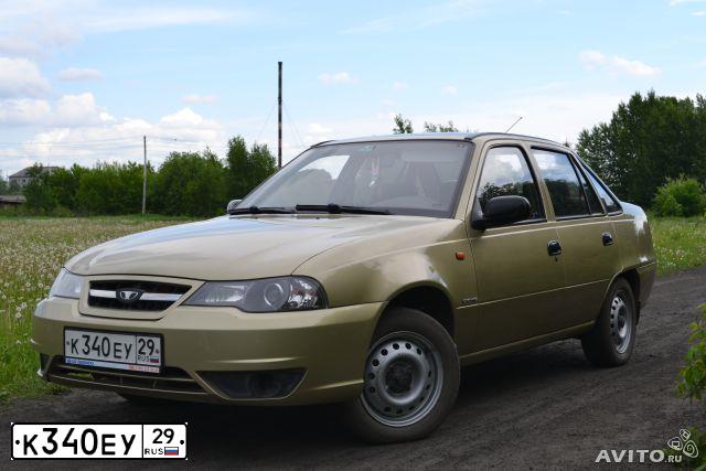 Фото автомобиля DAEWOO NEXIA, 2011 — госномер К340ЕУ29. Цвет: ПЕСОЧНЫЙ
