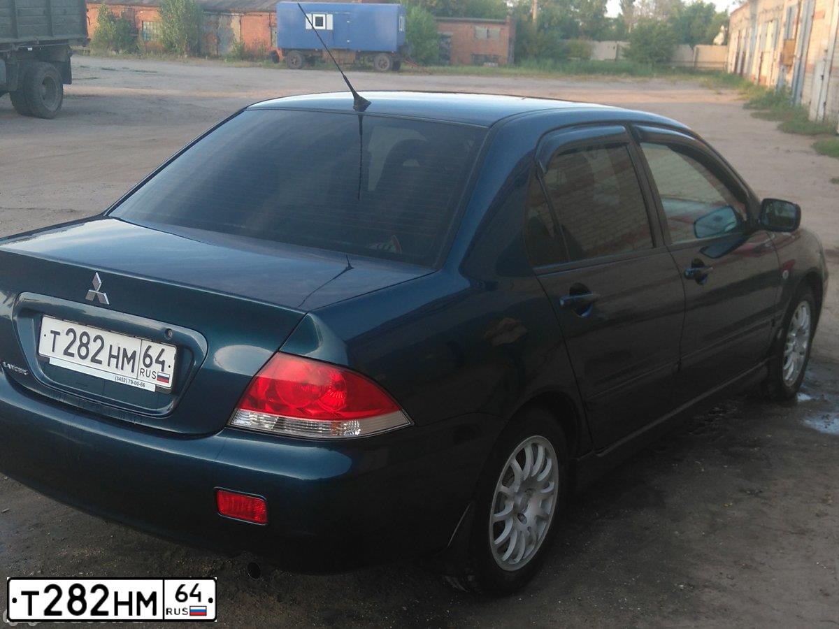 Фото автомобиля MITSUBISHI LANCER, 2005 — госномер Т282НМ64. Цвет: СИНИЙ