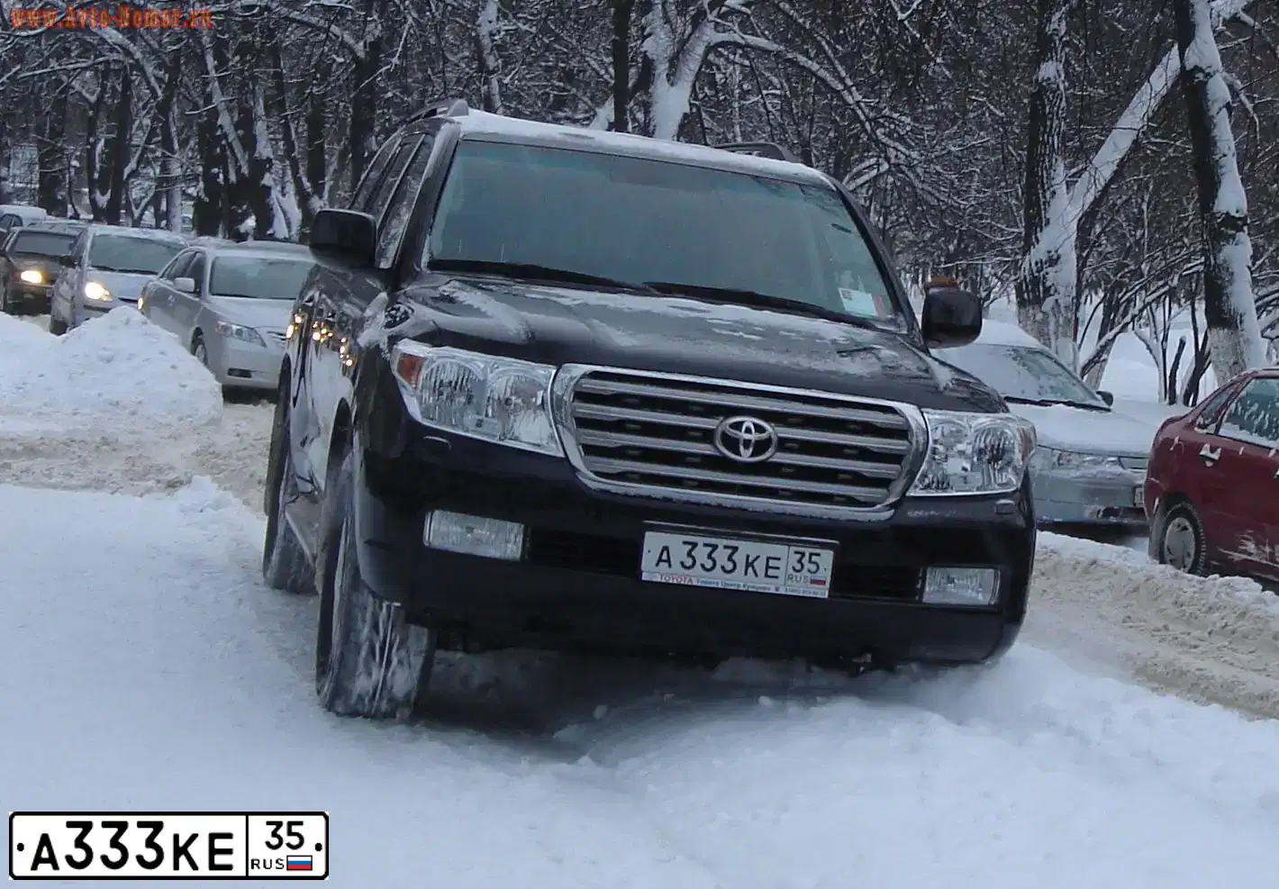 Фото автомобиля TOYOTA LANDCRUISER 200, 2009 — госномер Е489АУ11. Цвет: ЧЕРНЫЙ