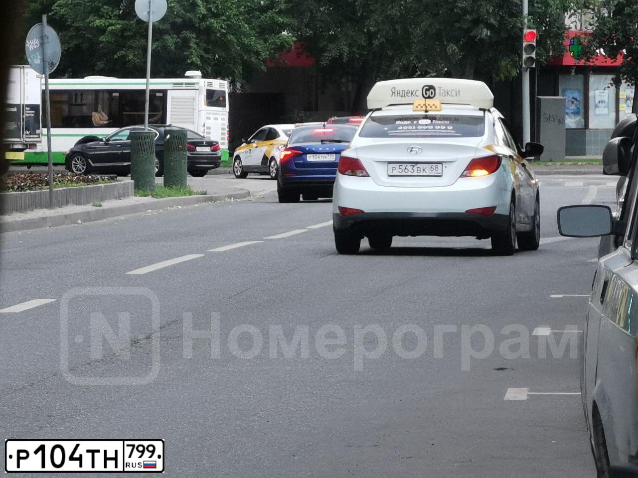 Фото автомобиля VOLKSWAGEN TIGUAN, 2020 — госномер М035ЕМ763. Цвет: ЧЕРНЫЙ