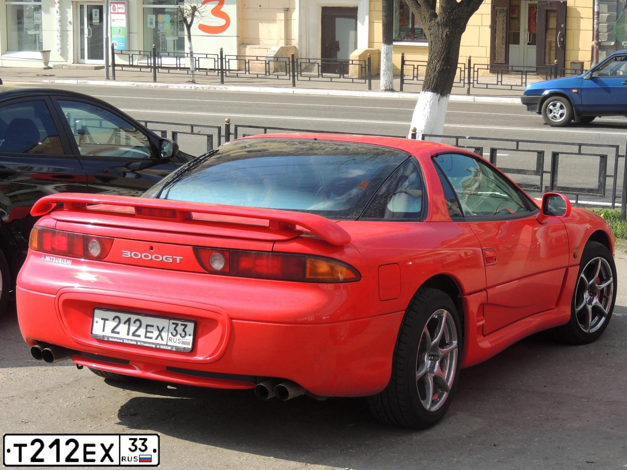 Фото автомобиля MITSUBISHI GTO/3000GT, 1997 — госномер Т212ЕХ33. Цвет: Красный