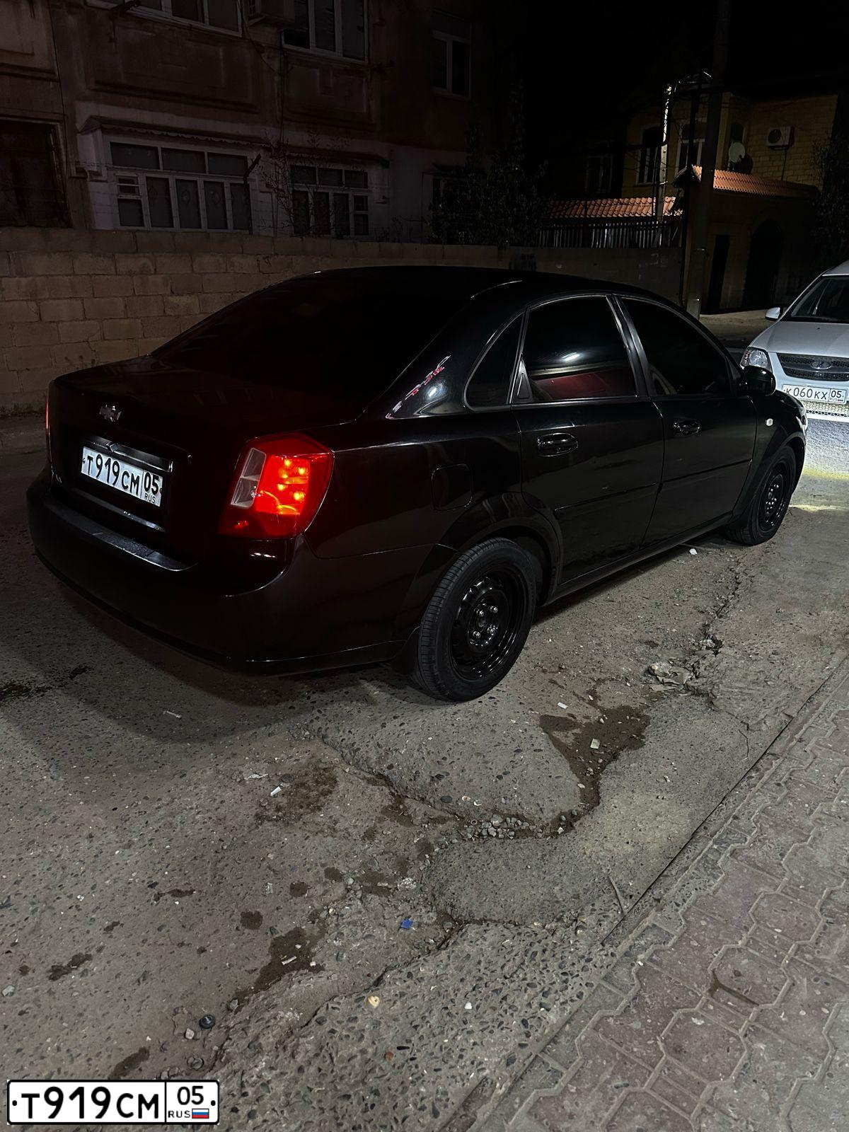 Фото автомобиля NISSAN ALMERA, 2007 — госномер Т919СМ05. Цвет: Серебристый