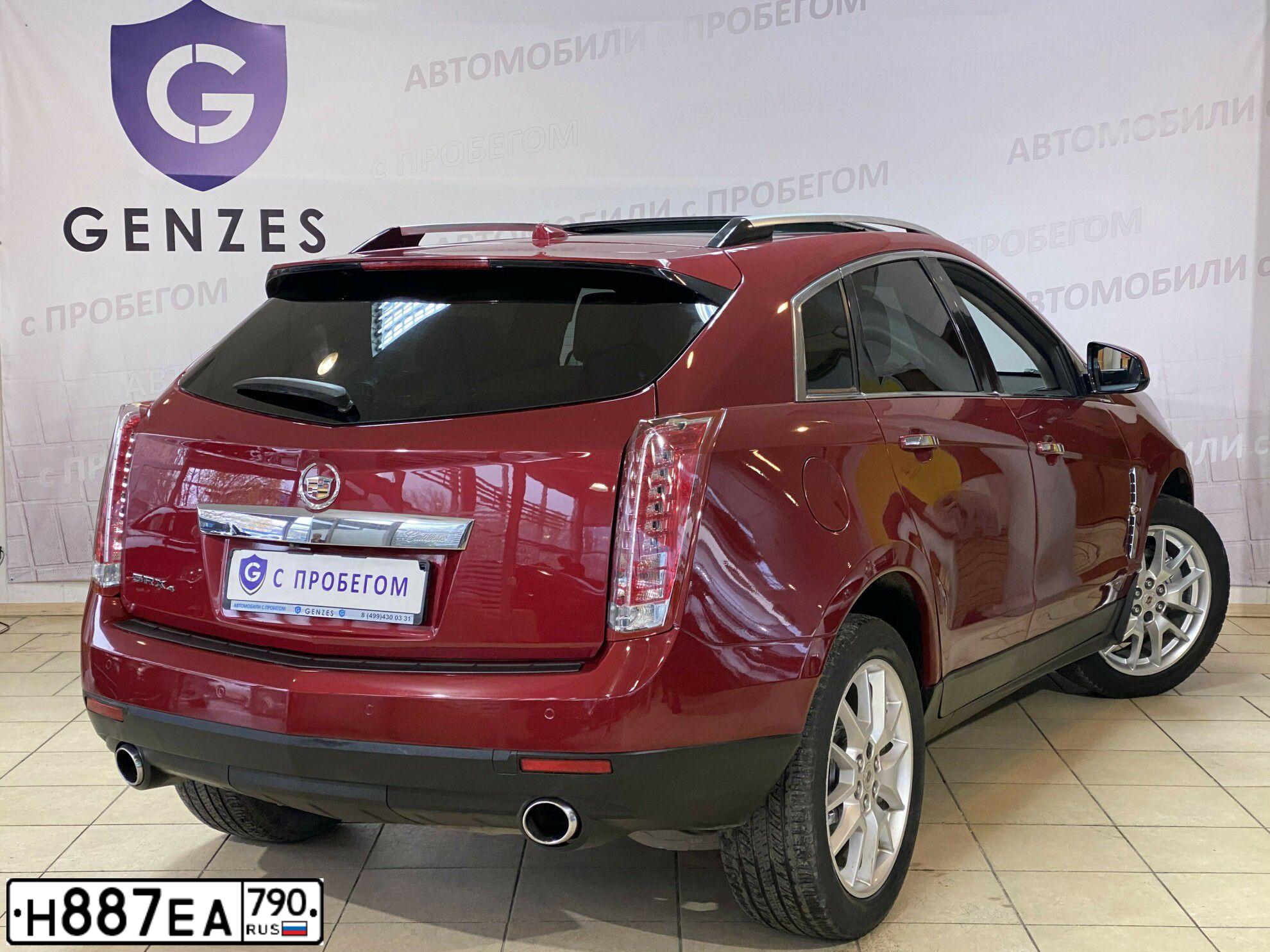 Фото автомобиля CADILLAC SRX, 2012 — госномер О557ЕХ797. Цвет: КРАСНЫЙ МЕТАЛЛИК