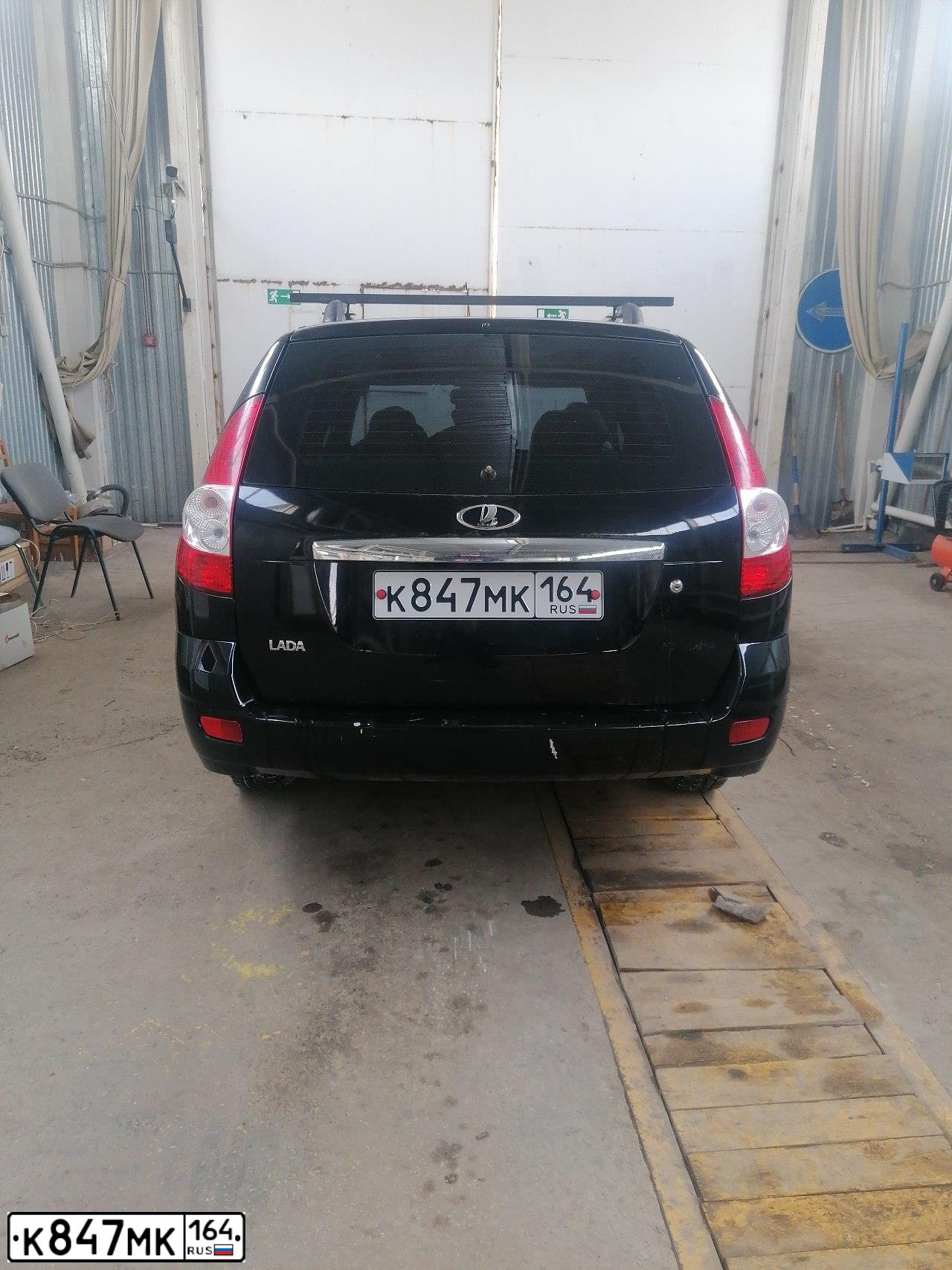 Фото автомобиля LADA 2171 PRIORA, 2012 — госномер К194УЕ164. Цвет: СИНЕ-ЧЕРНЫЙ