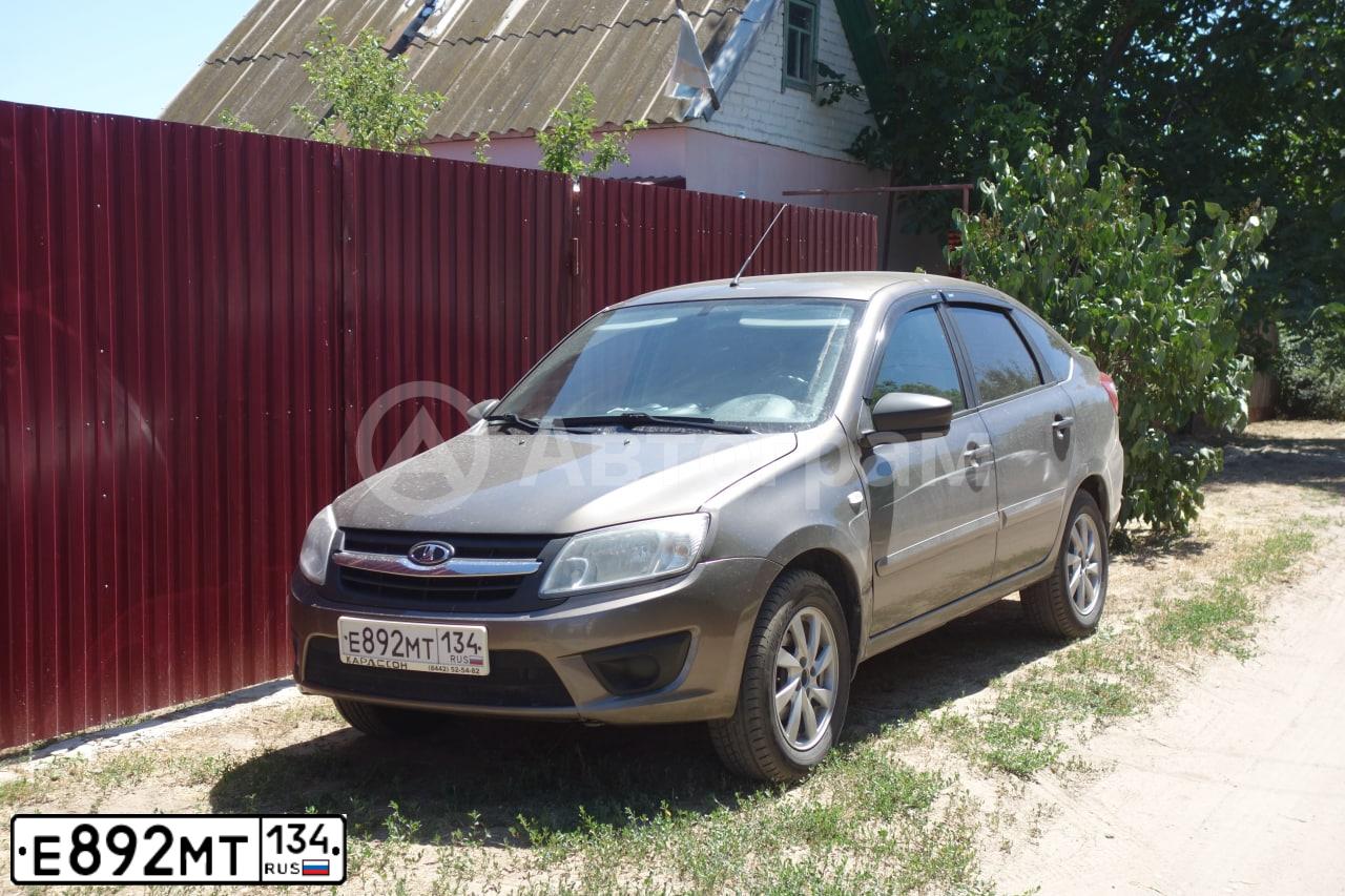 Фото автомобиля LADA 2191 GRANTA, 2018 — госномер Е892МТ134. Цвет: Золотисто-коричневый