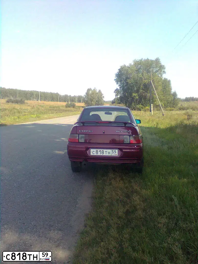 Фото автомобиля LADA 2110, 2005 — госномер К409ХН196. Цвет: Красный