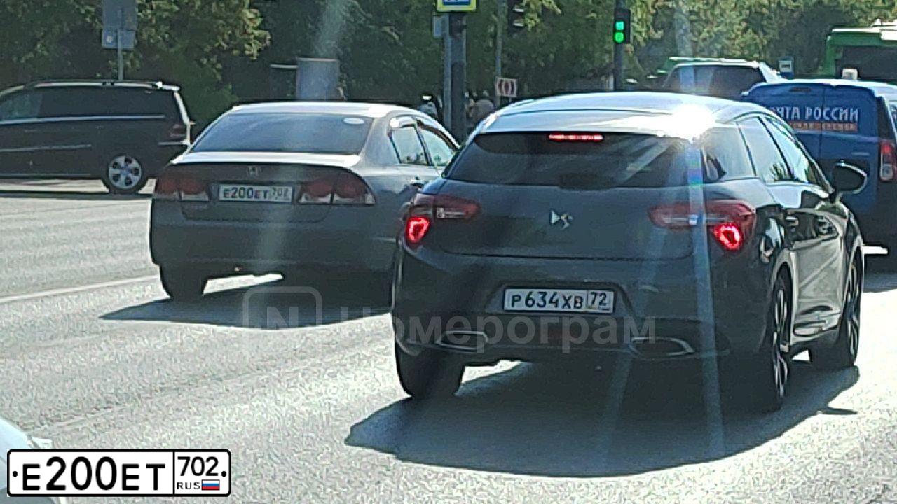 Фото автомобиля HONDA CIVIC, 2010 — госномер Е200ЕТ702. Цвет: СЕРО-КОРИЧНЕВЫЙ