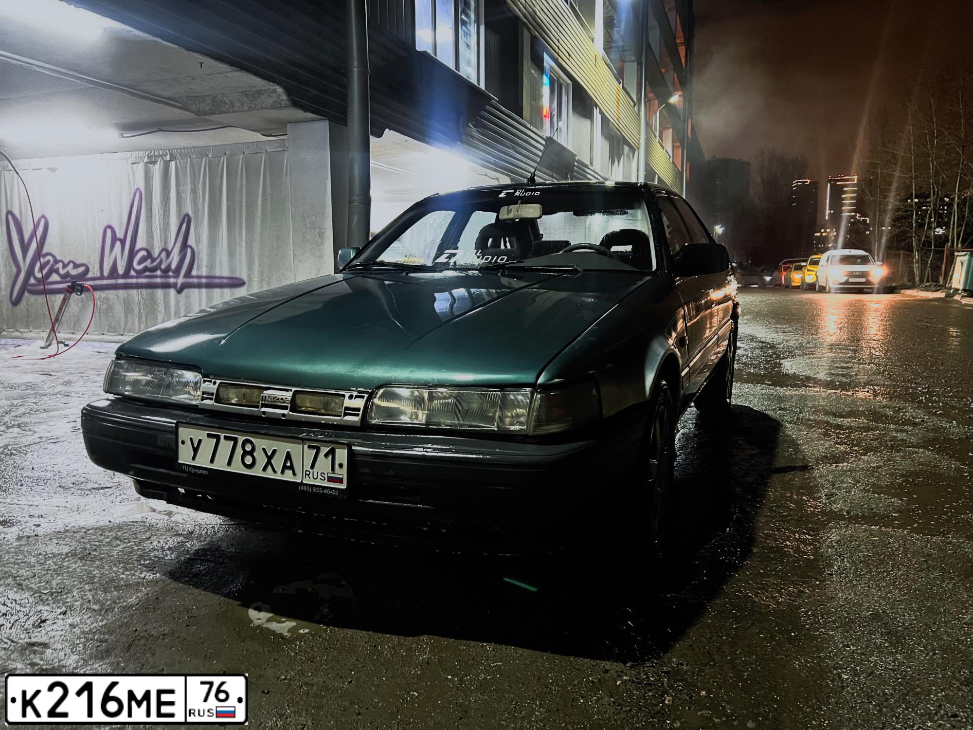Фото автомобиля MAZDA 626, 1991 — госномер Р415ОА32. Цвет: сине-зеленый