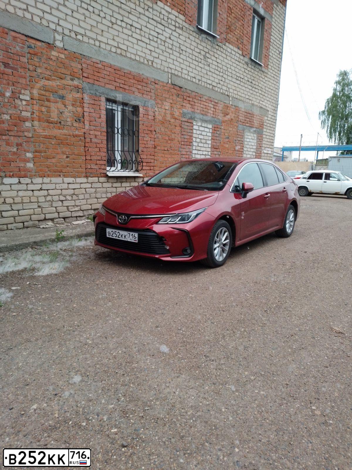 Фото автомобиля TOYOTA COROLLA, 2019 — госномер В252КК716. Цвет: Красный