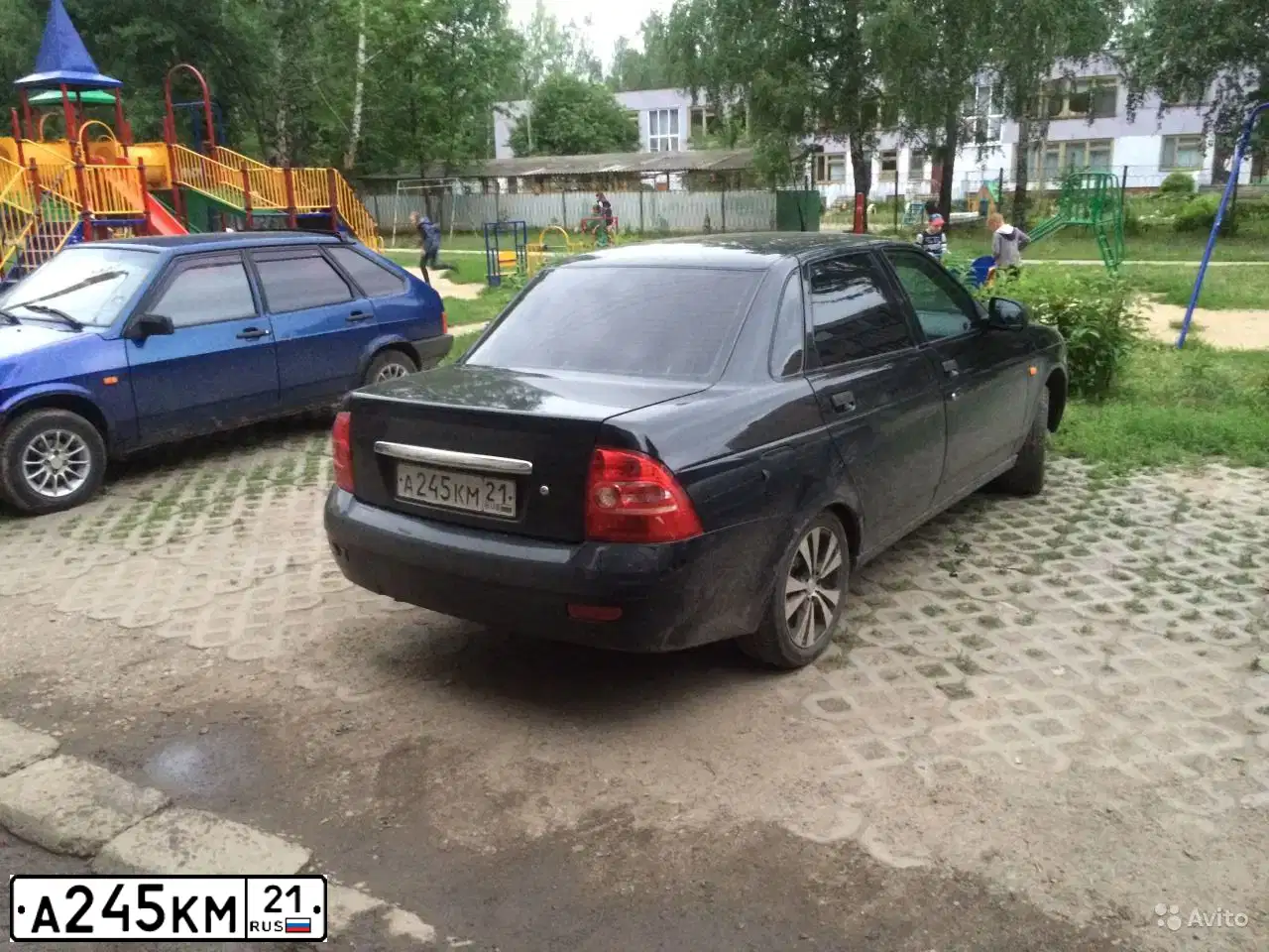 Фото автомобиля LADA 2170 PRIORA, 2011 — госномер А245КМ21. Цвет: СИНЕ-ЧЕРНЫЙ
