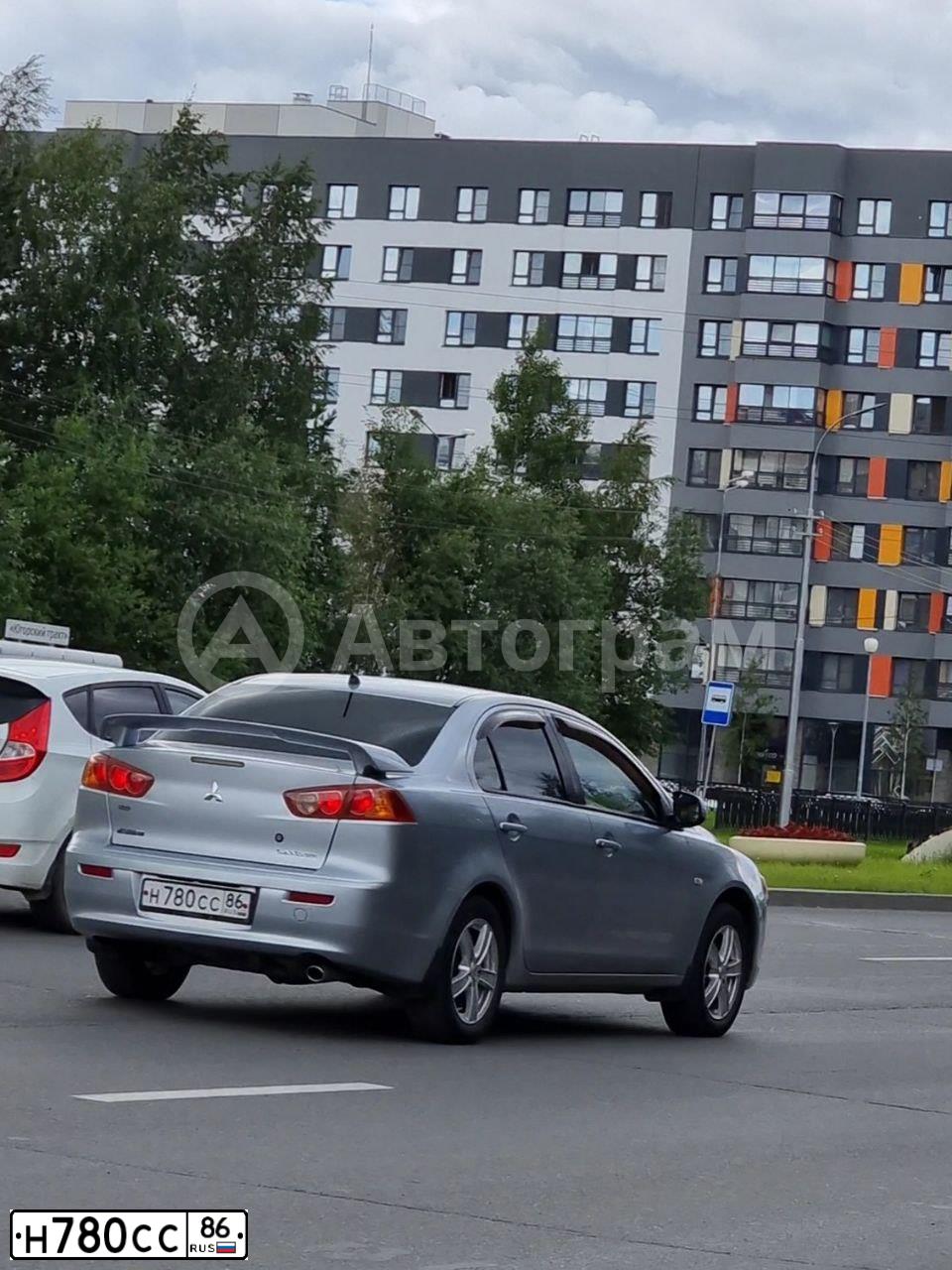 Фото автомобиля MITSUBISHI LANCER, 2008 — госномер О047ВР550. Цвет: СЕРЕБРИСТЫЙ