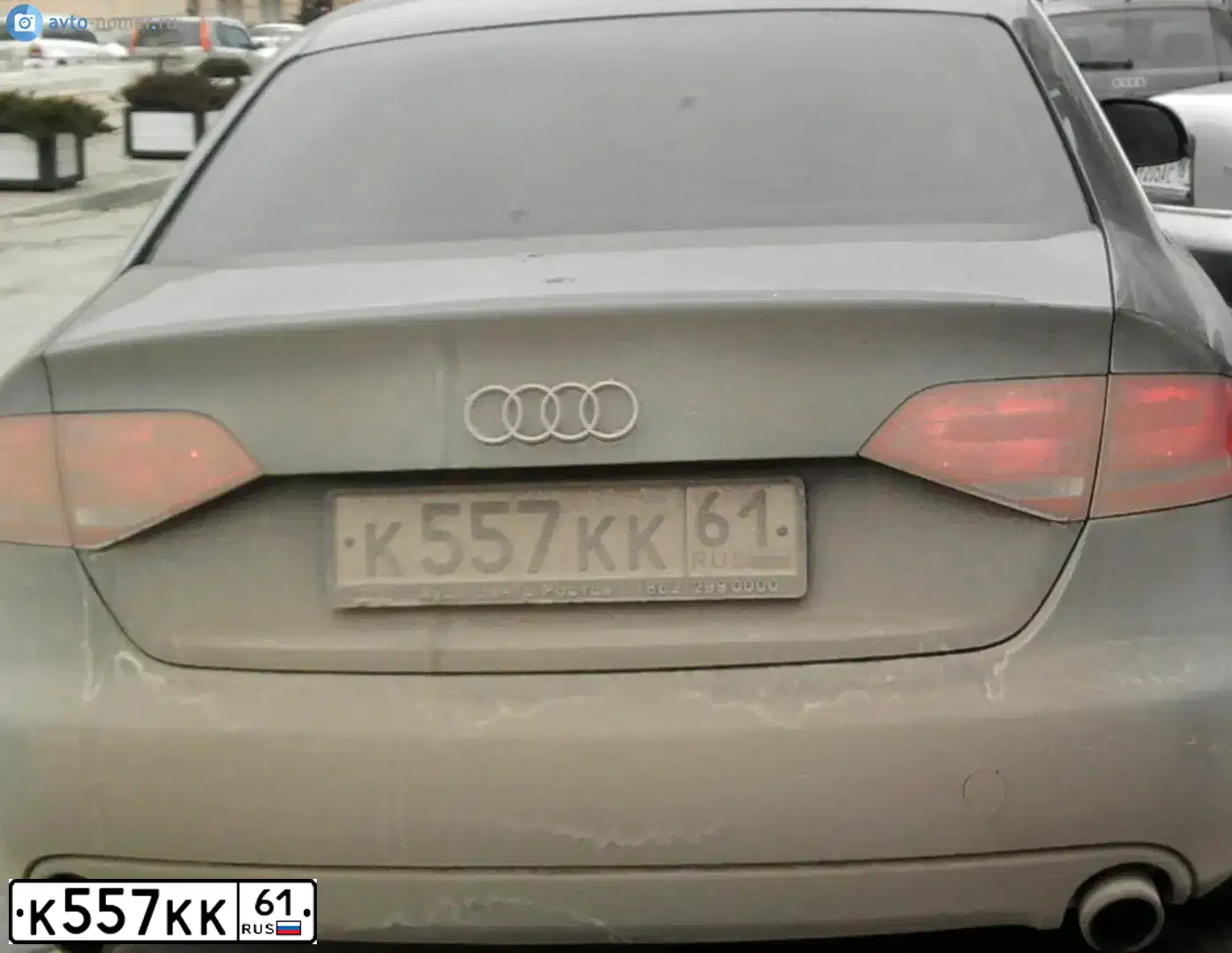 Фото автомобиля BMW X1, 2012 — госномер К557КК61. Цвет: БЕЛЫЙ МЕТАЛЛИК