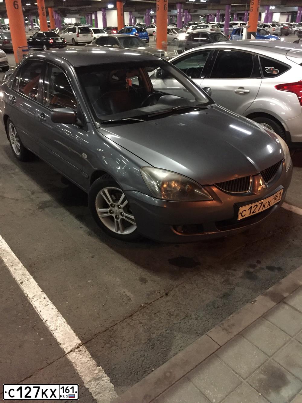 Фото автомобиля MITSUBISHI LANCER, 2005 — госномер С127КХ161. Цвет: Серый
