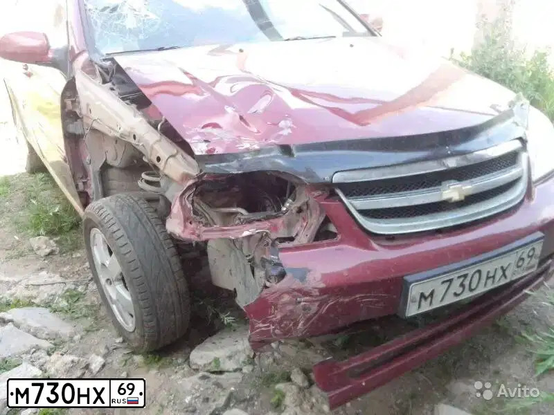 Фото автомобиля CHEVROLET LACETTI, 2008 — госномер М730НХ69. Цвет: КРАСНЫЙ