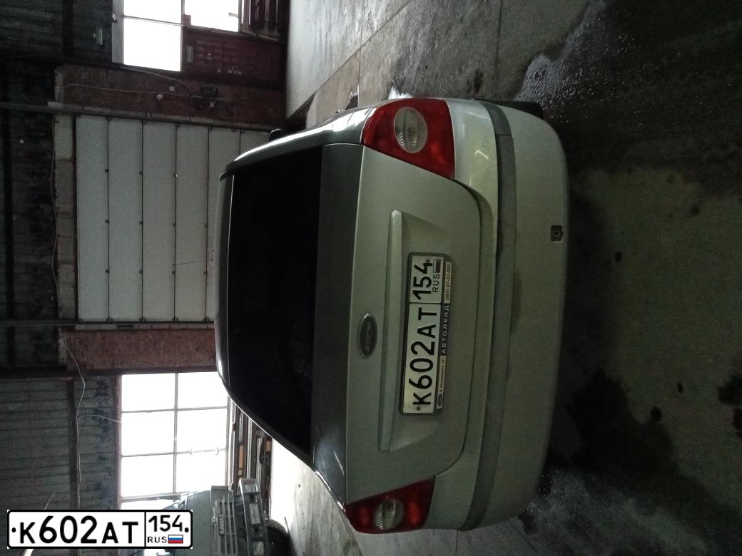 Фото автомобиля FORD FOCUS, 2007 — госномер К602АТ154. Цвет: серебристый