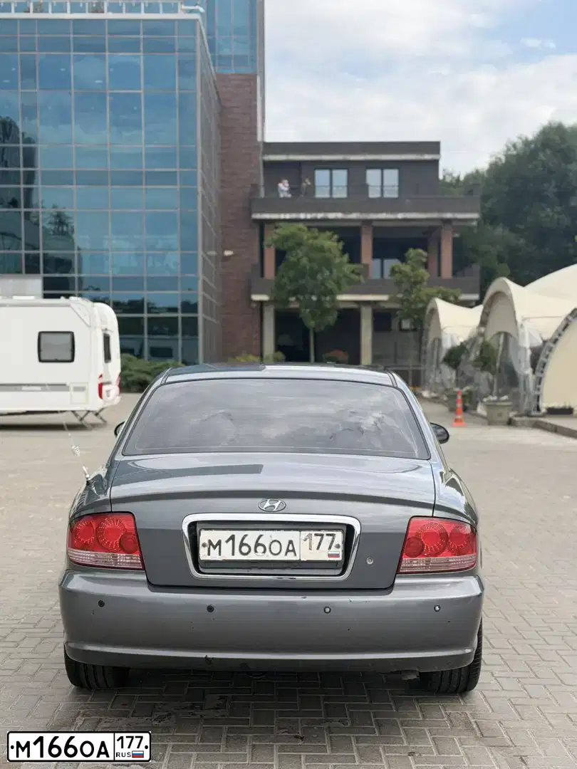 Фото автомобиля TAGAZ SONATA, 2006 — госномер М166ОА177. Цвет: СЕРЫЙ